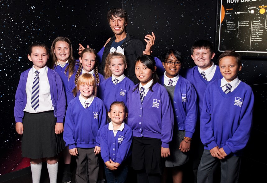 School Children with Brian Cox's wax figure on a school trip to Madame Tussauds Blackpool