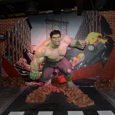 The Hulk figure smashing through a building on a New York set at Madame Tussauds Blackpool