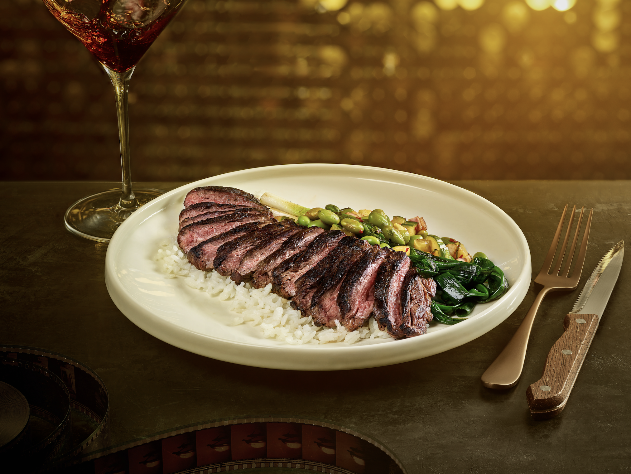 Skirt steak served over jasmine rice and cucumber edamame salad, The Hollywood Rooftop