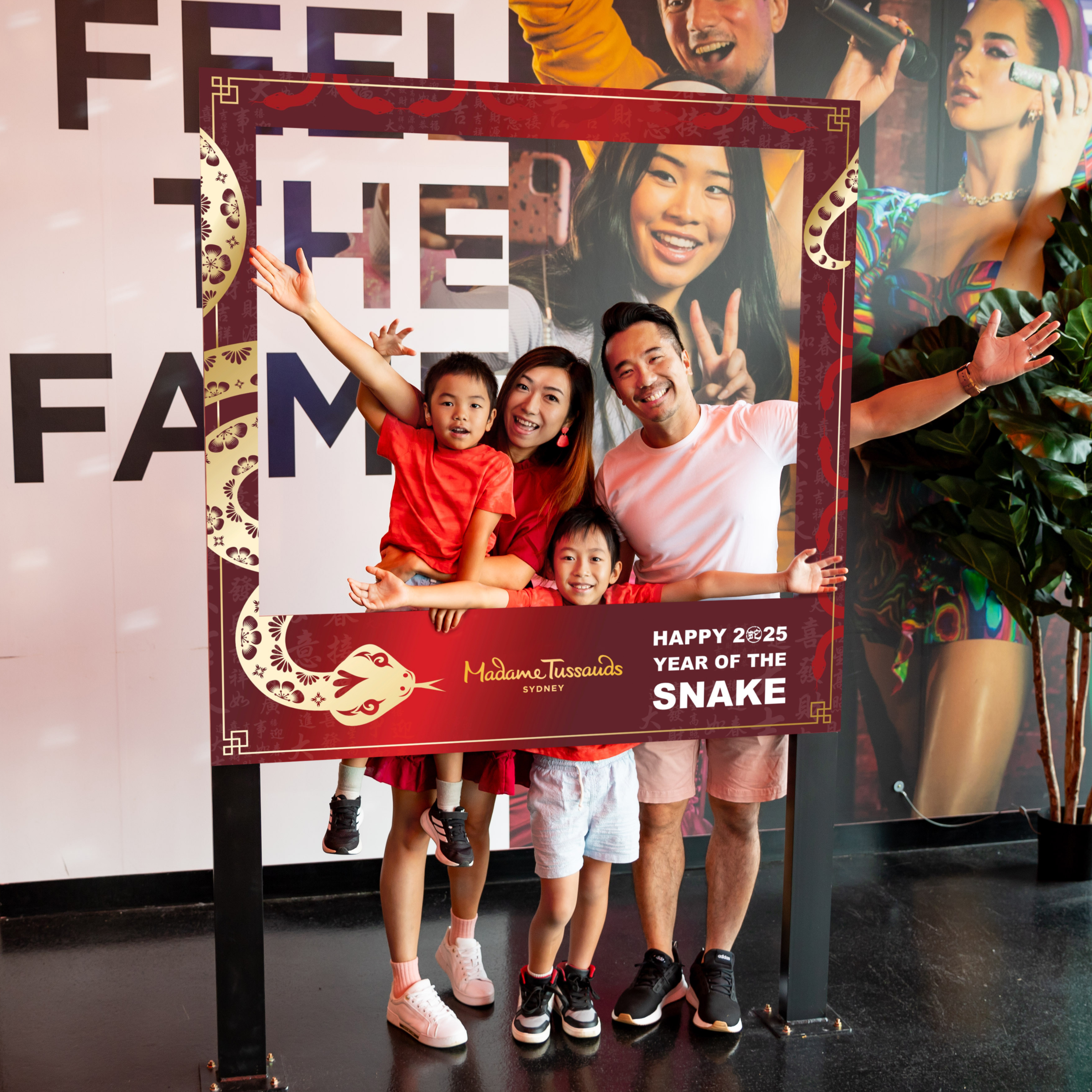 Guests Posing Inside 2025 Year Of The Snake Lunar New Year Frame